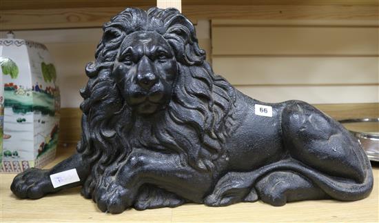 A cast iron lion length 69cm